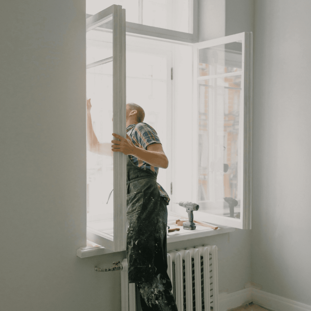 man checking window
