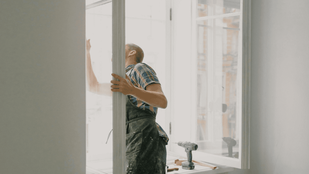 man checking window