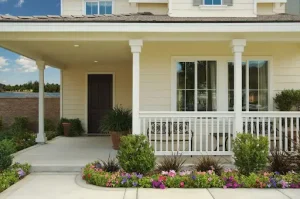 Inviting front porch with fresh paint and landscaping highlighting the best exterior upgrades for homeowners.