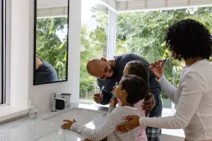 Family enjoying natural light from new windows, one of the best exterior upgrades for comfort and home value.