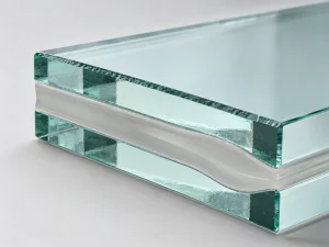 Cross-section of laminated impact-resistant glass showing the plastic interlayer bonded between two glass panes